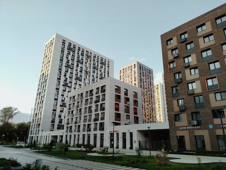 Low-angle shot of contemporary apartment buildings in Moscow, showcasing urban architecture.